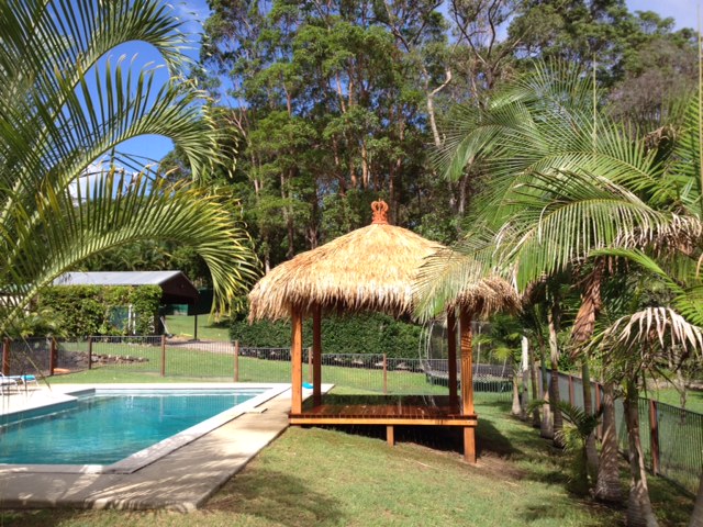 A bali hut by a pool a great outdoor living idea