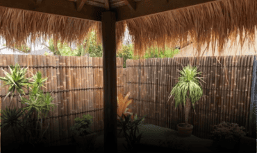 Bamboo panels adding privacy to a Bali hut outdoor living area on the Sunshine Coast.