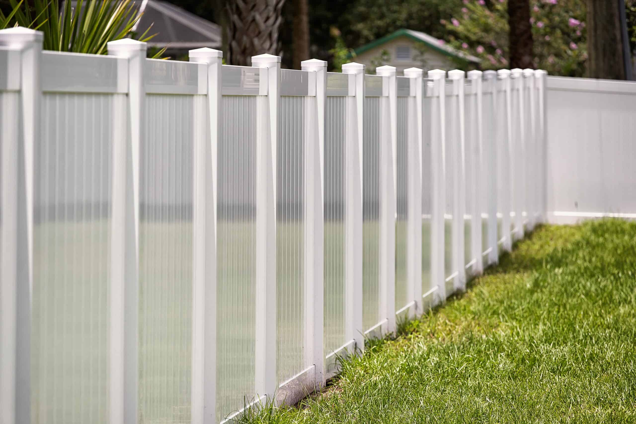 Hamptons style white pvc fence.
